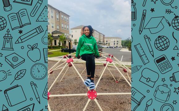 Sophia on jungle gym