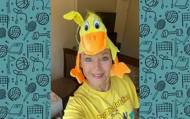 Ms. Osborne selfie with a duck hat on