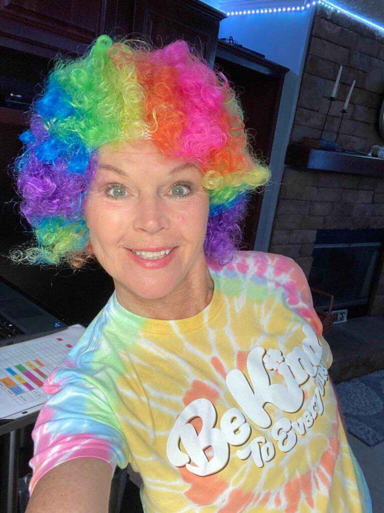 Ms. Osborne with a rainbow wig on