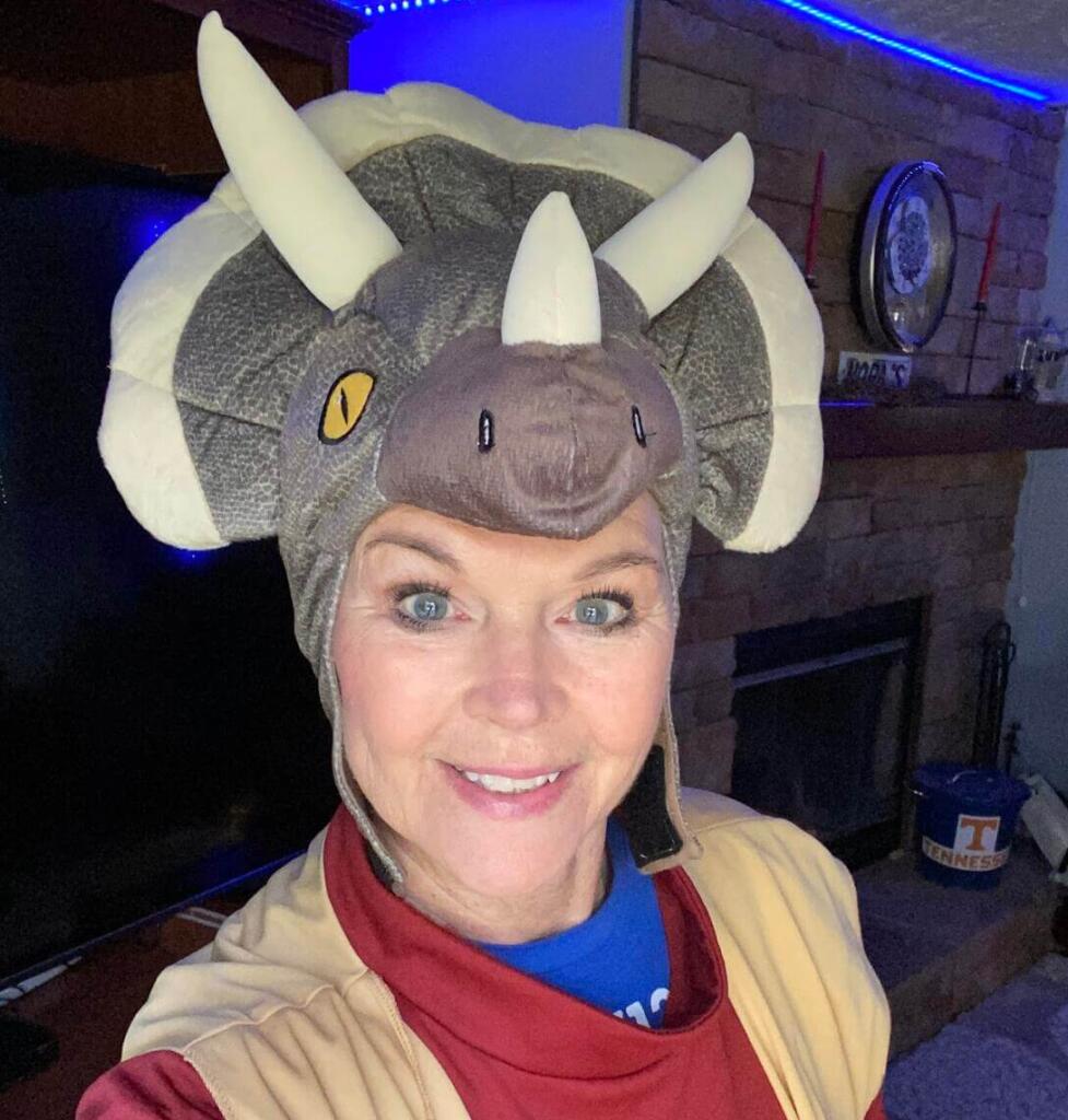 Ms. Osborne with a dinosaur hat on