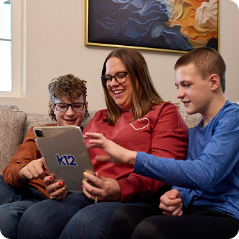 students looking the iPad